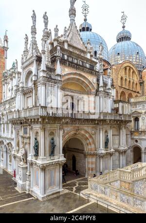 Venice, Italy – May 20, 2017: Beautiful Doge`s Palace or Palazzo Ducale in Venice. It is famous tourist attraction of Venice. Ornate facade of Doge`s Stock Photo